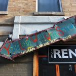 Old building exterior with a vintage arrow sign and a ‘For Rent’ notice, illustrating landlord responsibilities
